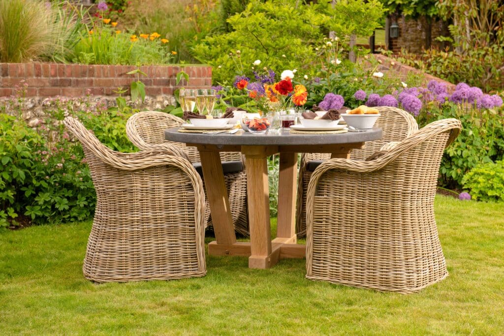 Oxenwood's Circular Outdoor DiningTable and Woven Chairs