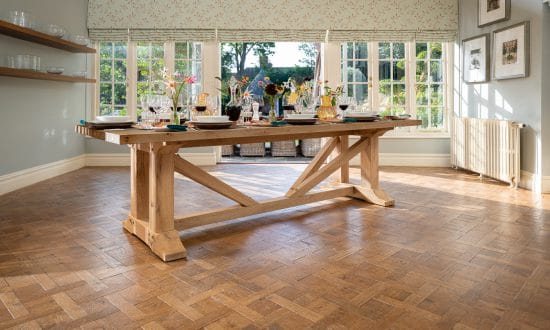 A laid indoor wooden dining table