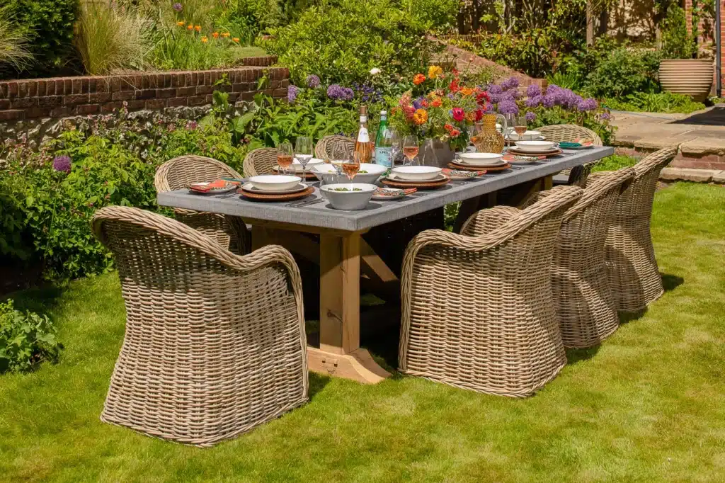 Hagen outdoor dining table fully set with seating