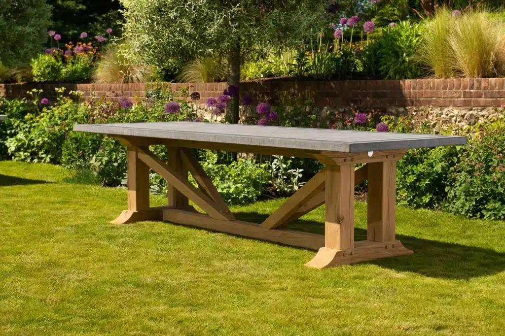 Hagen outdoor solid oak dining table in outdoor settings