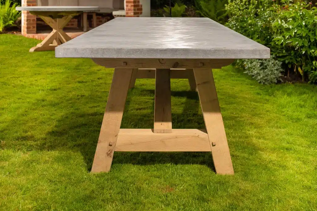 Lucius outdoor dining table side view in outdoor settings