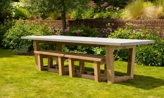 Marcus luxury outdoor dining table with benches in a garden setting